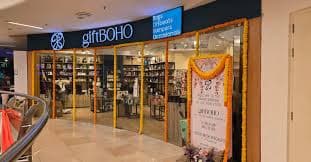 Champagne glass surrounded by celebratory treats